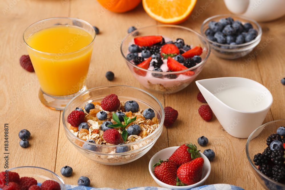 Rich breakfast on natural wooden table Rich breakfast on natural wooden table