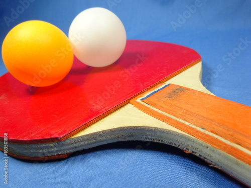 table tennis bat and ball