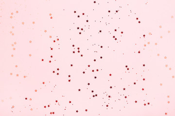 Pink background with red star glitter.