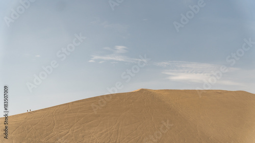 Huacachina desert and dunes of sand in Ica region, Peru.