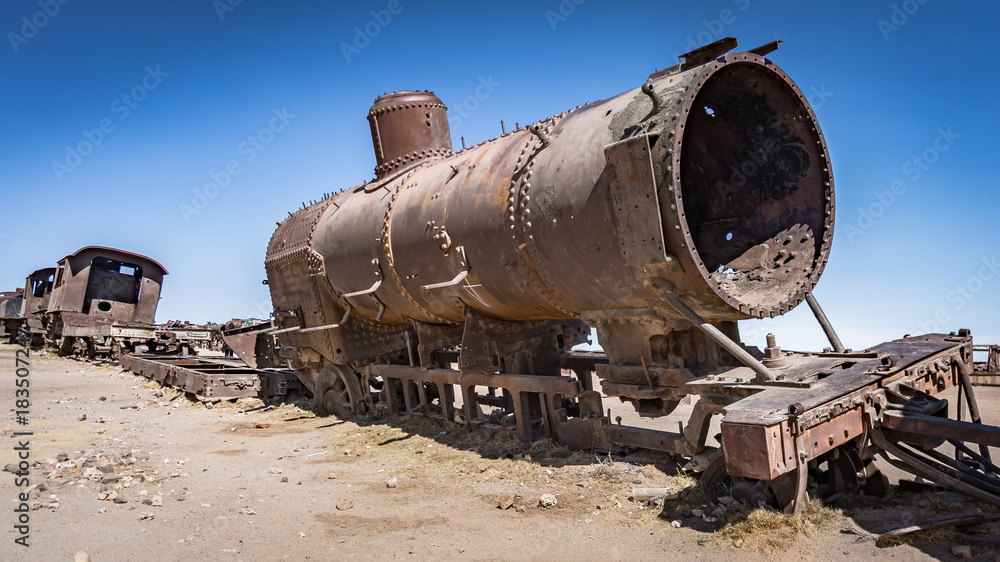Rusty old train at the Train Cemetery in Uyuni desert, Bolivia, South America