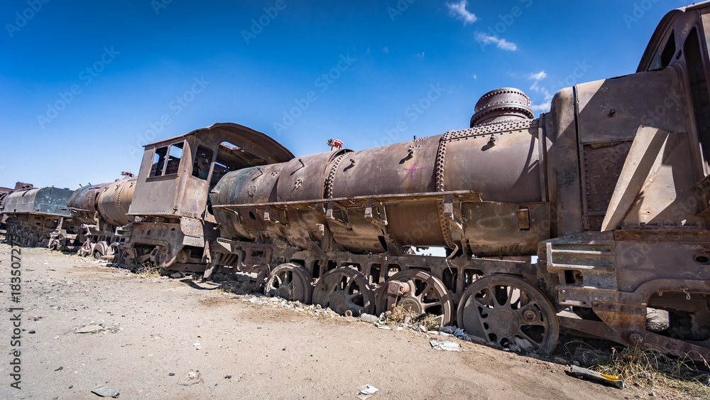 Rusty old train at the Train Cemetery in Uyuni desert, Bolivia, South America Rusty old train at the Train Cemetery in Uyuni desert, Bolivia, South America