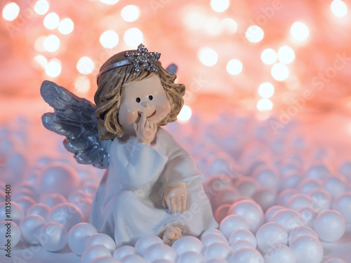 Christmas angel with shiny star on a twinkle background 2