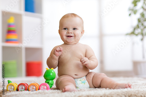 Adorable little baby in dia...