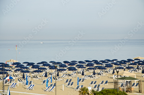 umbrella files on the beach © roberto muratore