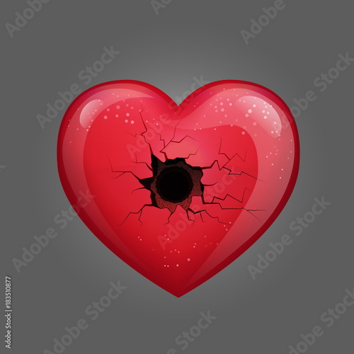 Red glossy heart with a bullet hole