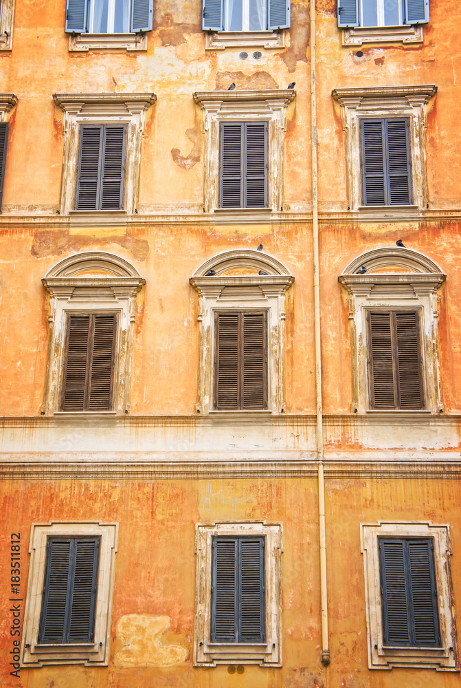 View of old building and windows in historical centre of Rome - Italy