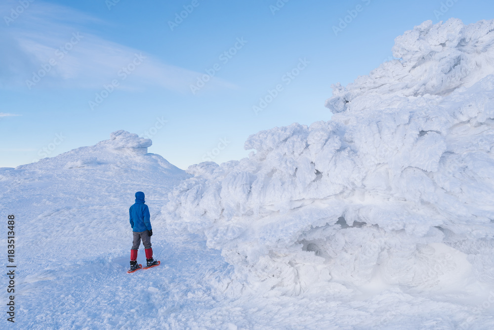Tourist walks in the winter mountains