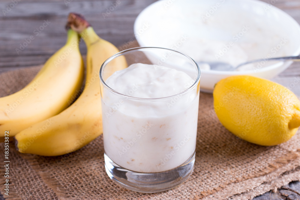 Yogurt with banana in a glass cup Yogurt with banana in a glass cup