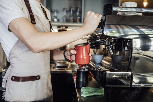 Barista making coffee