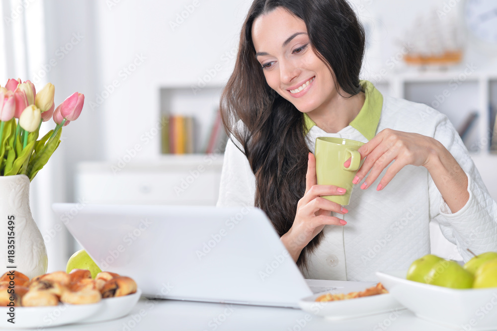 woman using   laptop
