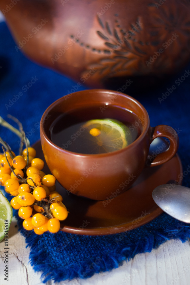 Sea buckthorn tea with lime, ready to drink. Sea buckthorn tea with lime, ready to drink.