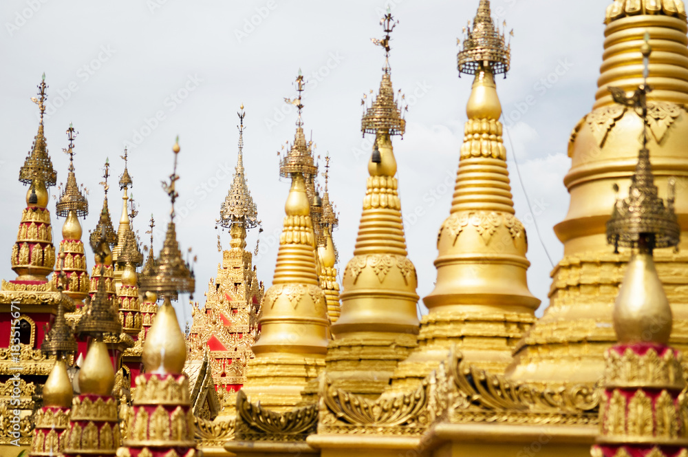 Fototapeta premium Simulate of Shwedagon Pagoda at Suwankiri Temple, Ranong, Thailand