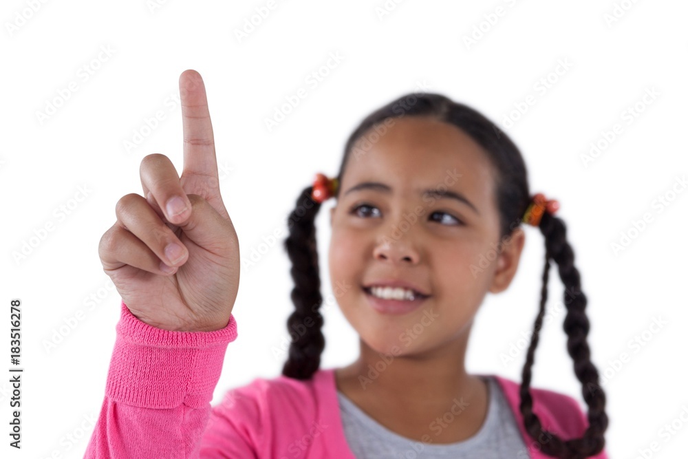 Girl pretending to touch an invisible screen Girl pretending to touch an invisible screen