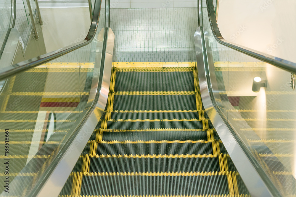 Escalator in Mall, Shopping Center or Department Store. Escalator in Mall, Shopping Center or Department Store.