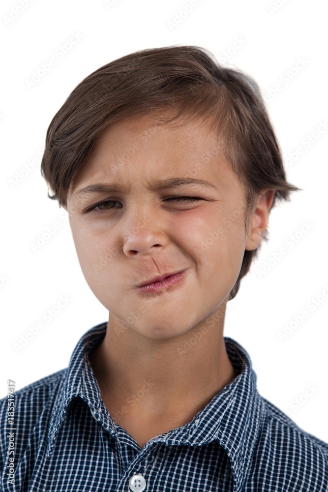 Cute boy standing against white background Cute boy standing against white background