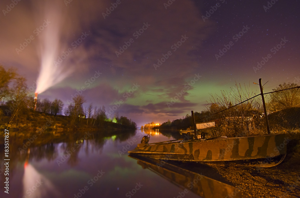 Lights above the lake,man with a dog-Aurora borealis