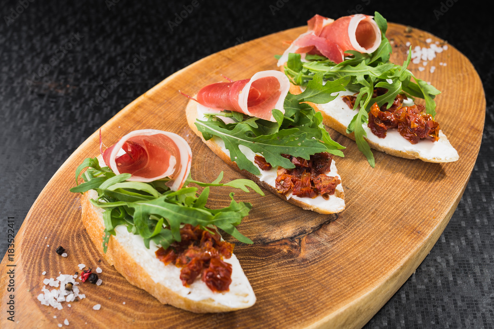 appetizer bruschetta with tomato and bacon