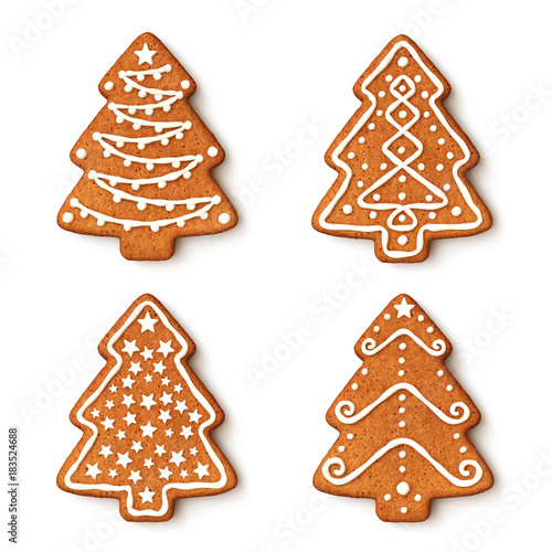 Set of gingerbread christmas tree cookies with ornaments photo