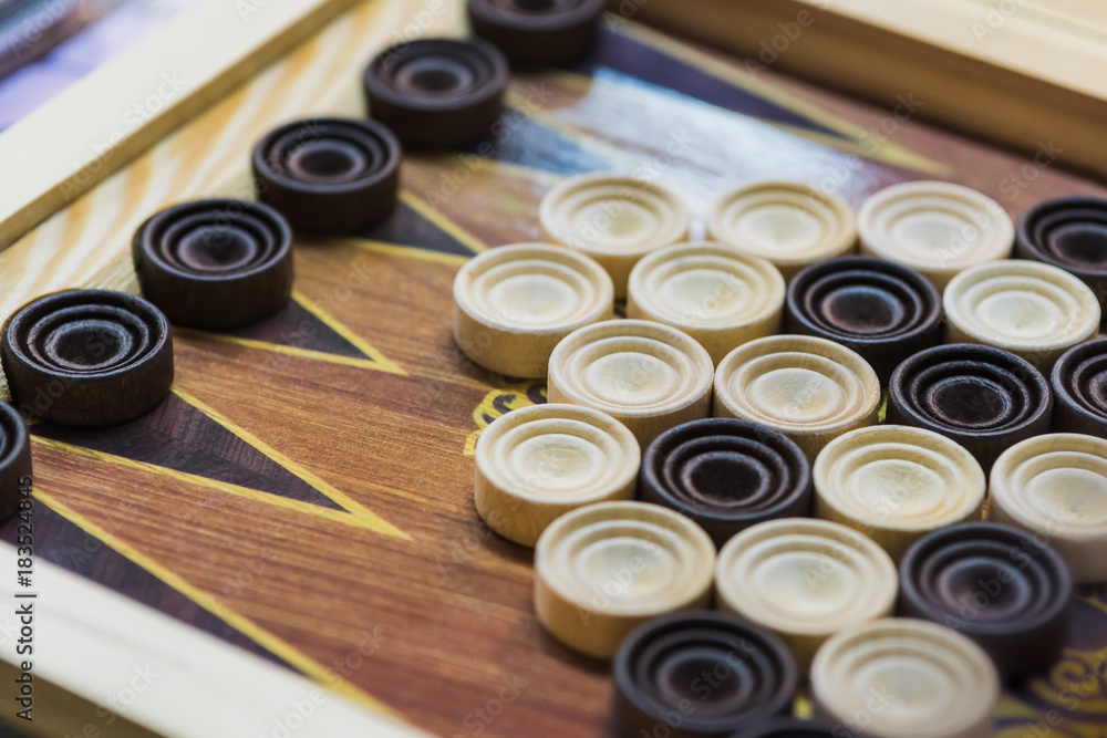 Wooden backgammon. Play a board game. Wooden backgammon. Play a board game.