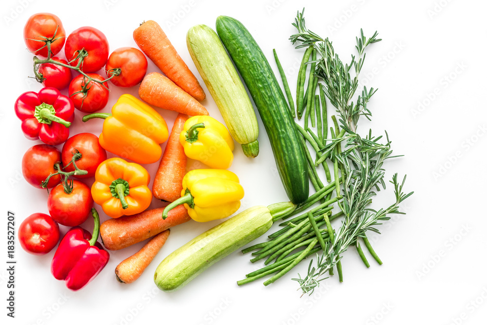 Colorful vegetables for healthy diet. Paprika, tomatoes, carrot, zucchini, eggplant on white background top view