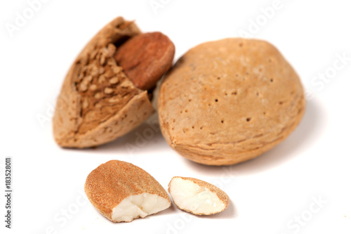 Sweet almonds on white background