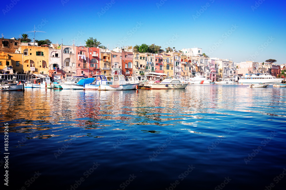 Marina Grande with colorful old houses of Procida island, Italy, retro toned