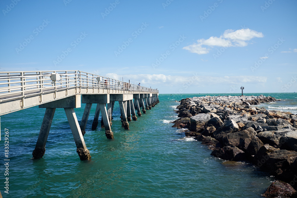 Natural rock breakwater and pier in Florida Natural rock breakwater and pier in Florida