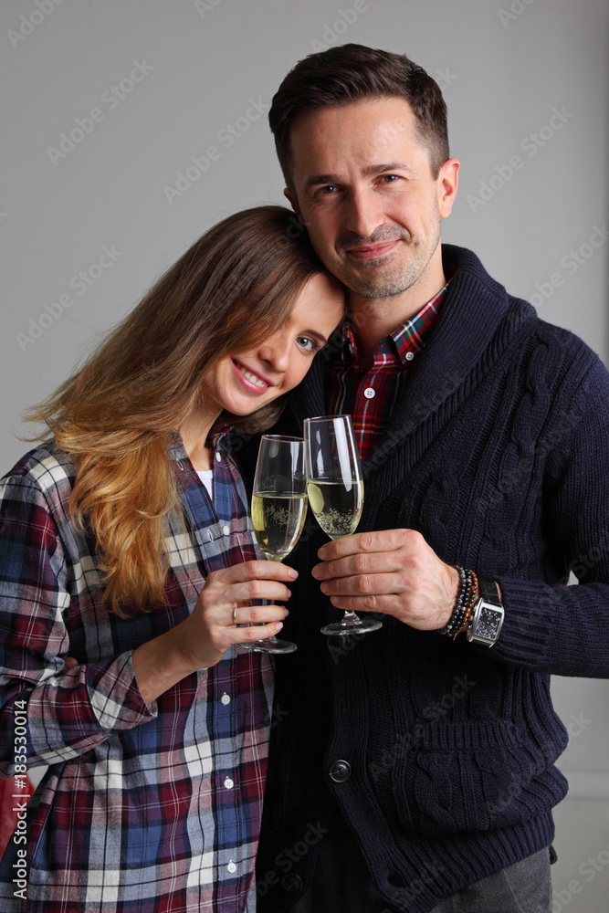 Couple clinking glasses of champagne Couple clinking glasses of champagne
