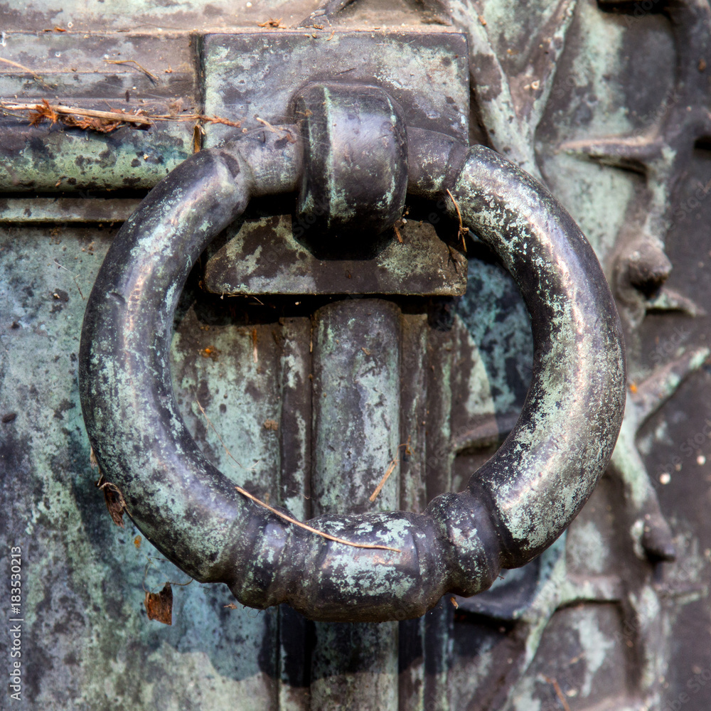 Closeup of a old metal door knocker. Closeup of a old metal door knocker.