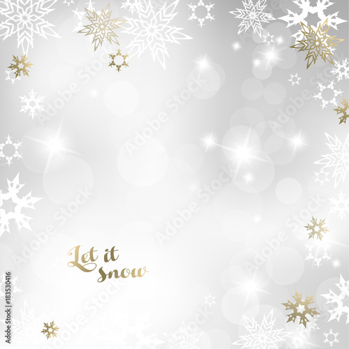 Christmas light background with white and golden snowflakes.