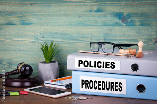 Policies and Procedures. Successful business, law and profit background. photo