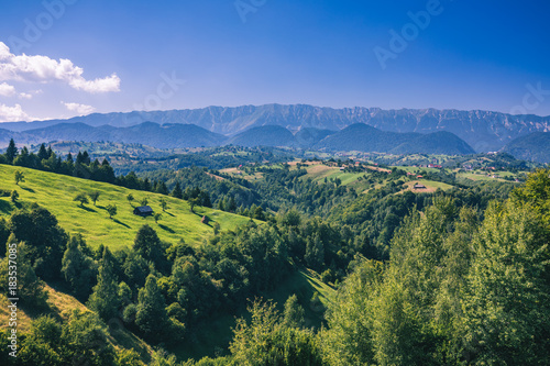 Fototapeta Naklejka Na Ścianę i Meble -  Stunning alpine landscape and green fields, Transylvania, Romania, Europe