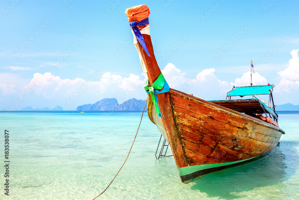 Traditional thai long tail boat at famous sunny long beach, Kradan island, Trang province ,Thailand Traditional thai long tail boat at famous sunny long beach, Kradan island, Trang province ,Thailand