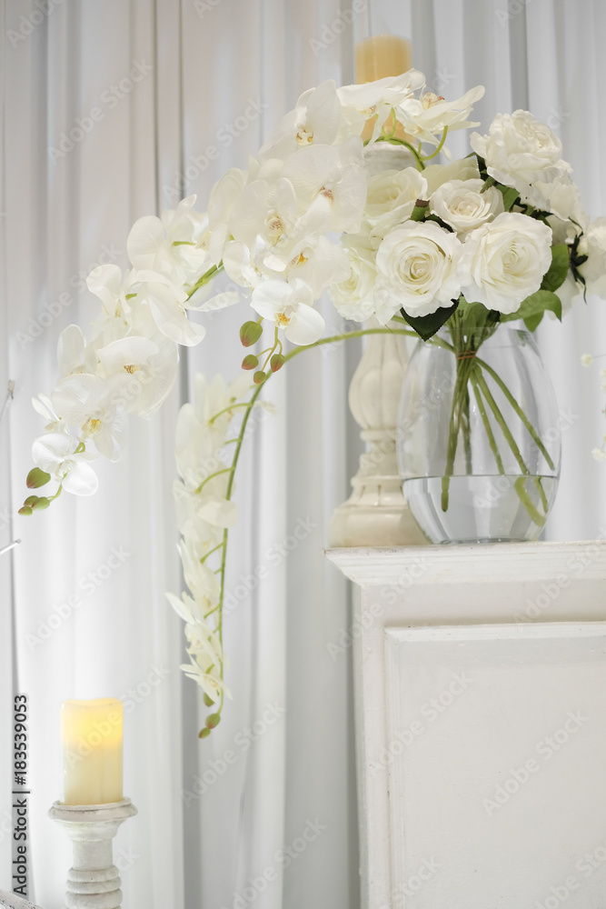 white flower display in the vase - soft focus white flower display in the vase - soft focus