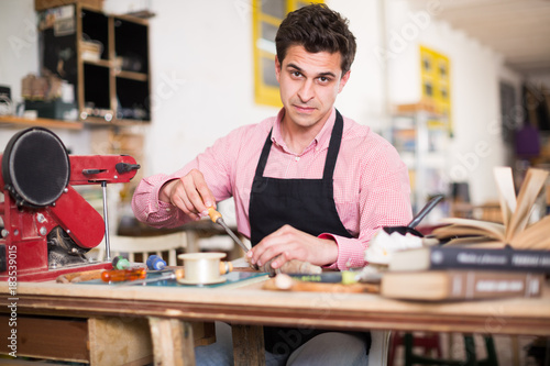 Carpenter working in studio