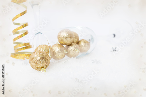 Overturned champagne glass as happy new year celebration concept