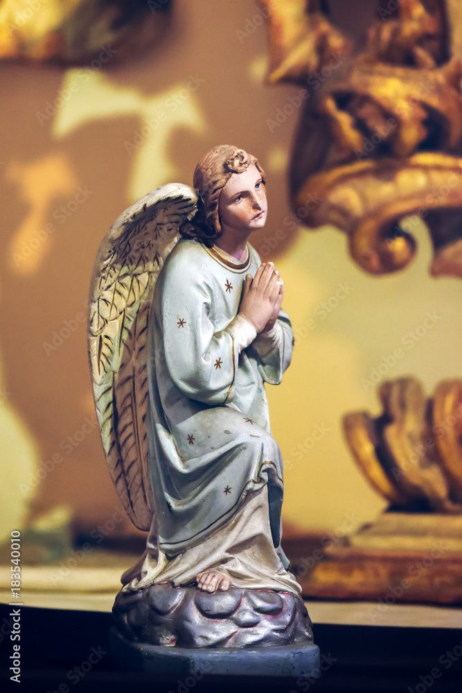 Statue of a Praying Angel in Prague