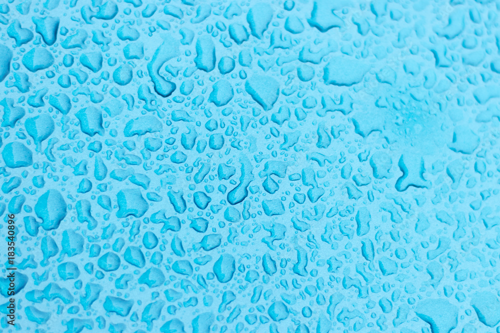 Drops of water on a blue metal. Drops of water on a blue metal.