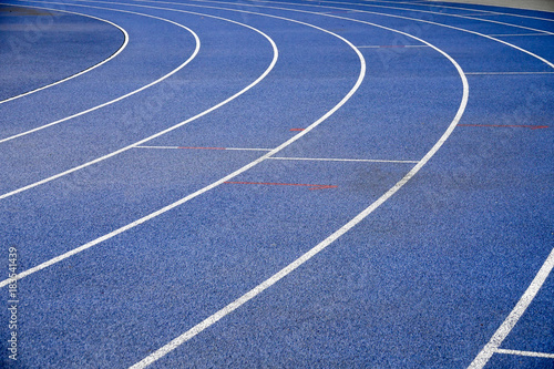 Blue racetracks with white markings. Specialized coating for running.