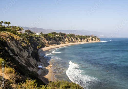 Paradise Cove Malibu, Zuma Beach, emerald and blue water in a quite paradise beach surrounded by cliffs. Malibu, Los Angeles, LA, California, CA, USA