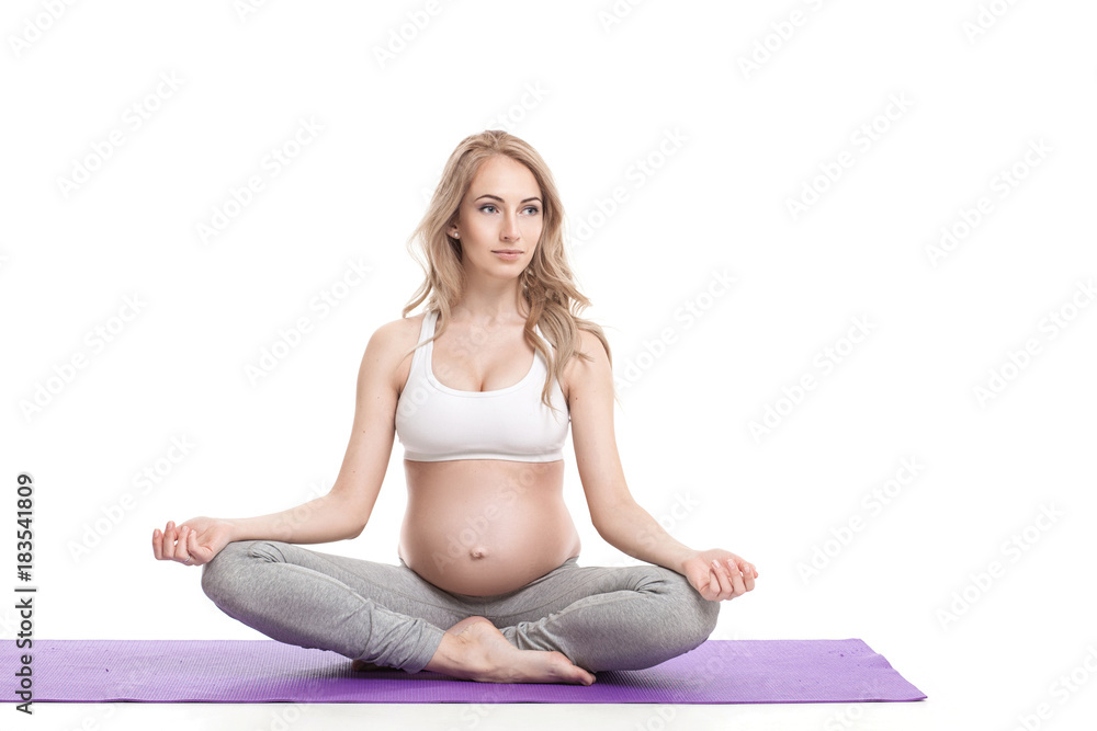 Portrait Of Pregnant Woman Doing Yoga