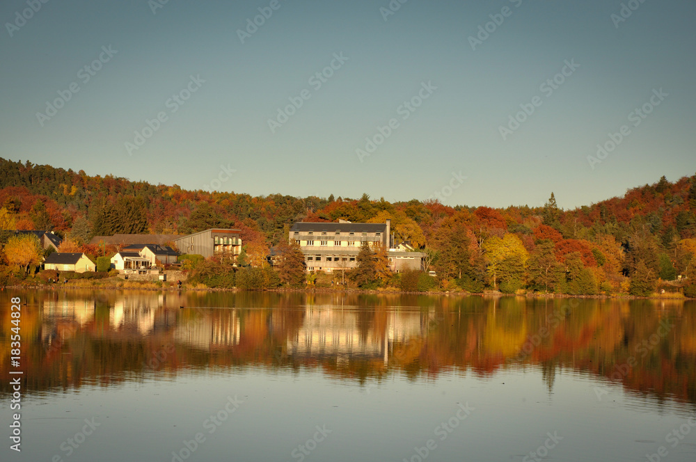 Reflections of Autumnal Colors on the Lake of Chambon