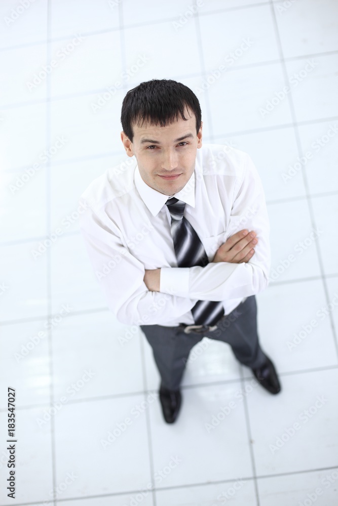 view from the top: portrait of smiling businessman view from the top: portrait of smiling businessman