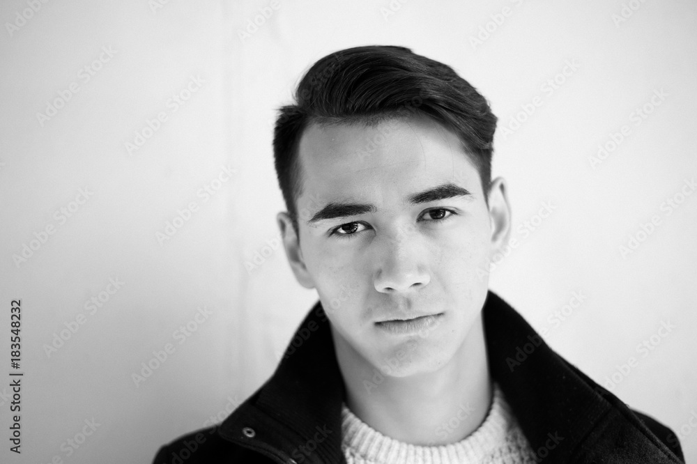 Young man looking into the camera , open look. . Model posing Young man looking into the camera , open look. . Model posing