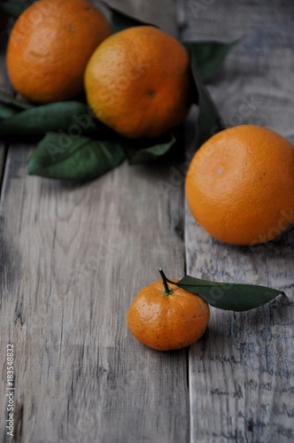 On the table are Christmas mandarins. The New Year is coming