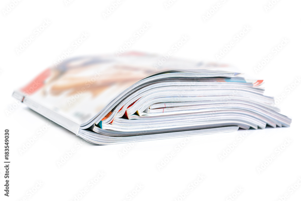 Stack of magazines isolated on white background Stack of magazines isolated on white background