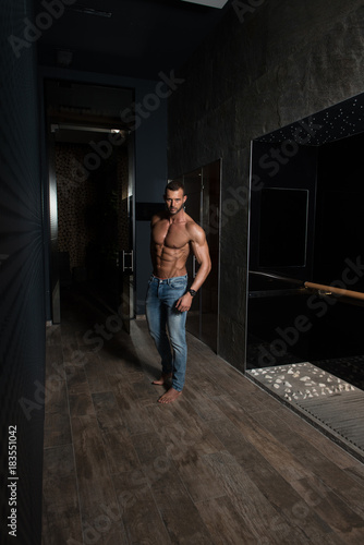 Model Standing Strong On Corridor © Jale Ibrak