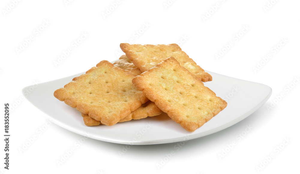 Cracker in a plate isolated on white background Cracker in a plate isolated on white background