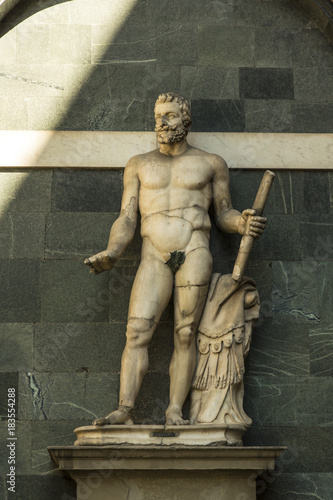 tatue of man with figleaf added for reasons of modesty , in Medici Palace, Florence, Italy